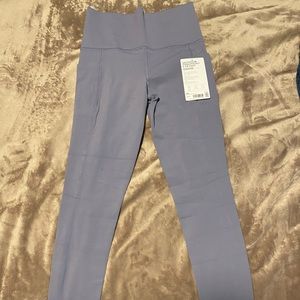 NWT lavender Athleta salutation stash pocket II 7/8 leggings